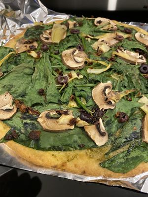 Cooked pesto pizza  at Country Aire Market in Port Angeles