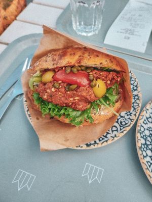 Mediterranean sandwich with sundried tomatos, olives, capers and basil, 89 sek. August 10th, 2025.  at Tradgardscafe - Slottstradgarden Ulriksdal in Solna