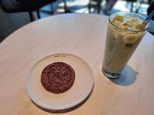Vegan chocolate cookie and iced oatmilk matcha latte. at Espresso House in Sandnes