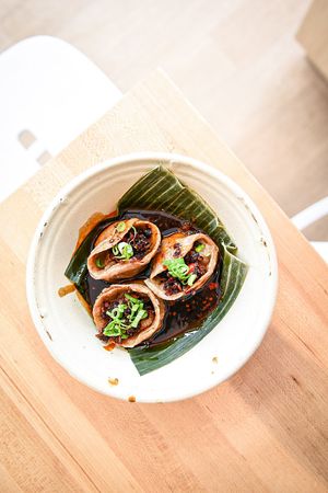 Chili oil dumplings at Mak Mak Organic  in Oceanside