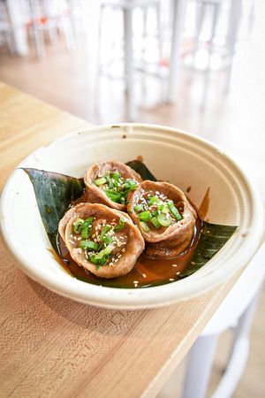 Vegan dumpling in sesame sauce at Mak Mak Organic  in Oceanside