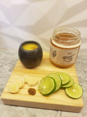 Immunity shot: lime juice | ginger | mesquite honey | cayenne at Tierra Santa BCS - Collaborative Coffee Shop in Todos Santos