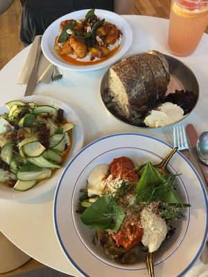Eggplant romesco, sourdough bread, cucumber salad and pumpkin noodles.  at Lychees in Warsaw