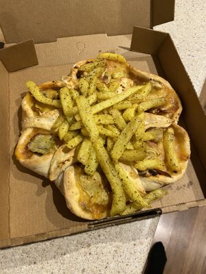 Small vegan artichoke pizza - ‘UFO’ style   at Pizza Infinity in Broadview