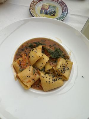 Vegan pasta of the day with tomato, arugula and carrots   at Ristorante Al Giardino in Taormina