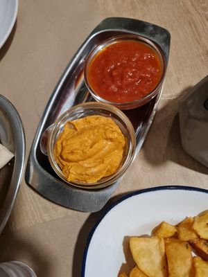 Patatas vegan side sauces at Ses Cosines Restaurant in Mallorca