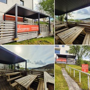 Our outside heated & sheltered decking area with fantastic views of Portree harbour at Pizzaway in Isle Of Skye