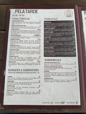 Menu! 1 leaf means vegetarian, 2 leaves mean vegan. And the brown circle means gluten free. Page 2  at Café 18 do Forte in Rio De Janeiro