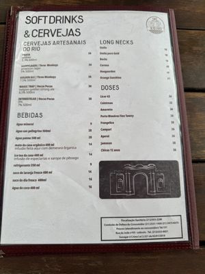 Menu! 1 leaf means vegetarian, 2 leaves mean vegan. And the brown circle means gluten free. Page 4  at Café 18 do Forte in Rio De Janeiro