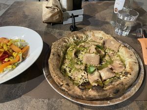 Vegan pistachio pesto and mortadella pizzaa  at Fratelli Panza in Udine