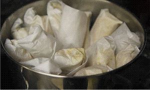 steaming the vegan tamales at Kitchen Witch Tea Room in Kensington