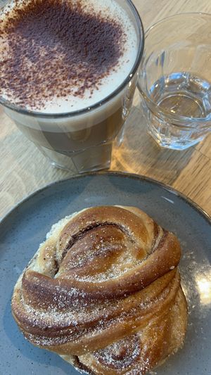 Cinnamon Bun and Chai Latte  at Godt Brød Munch Brygge in Oslo