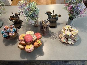 Plated doughnuts aside Cakerino cupcakes and a vegan Etsy seller’s cookies for a unicorn party!  at Bitchin Donuts in Albany