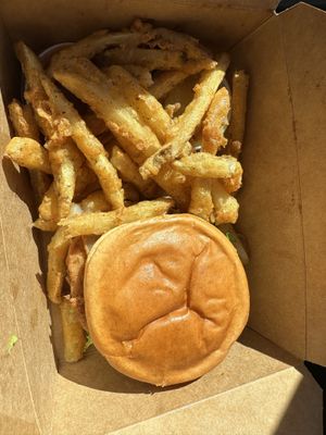 Chicken sandwich with fries  at Bitchin Donuts in Albany