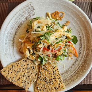 Vegan chicken salad with sesame crackers at La Moi Plant-Based Restaurant in Ho Chi Minh City