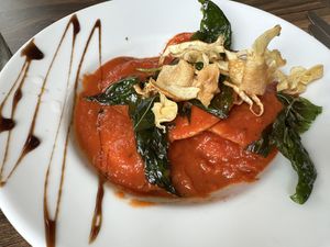 Ravioli (stuffed with chickpea and veggies, served in a tomato crème sauce with crispy parsnip, etc.)  at L'Osteria Italiana in York
