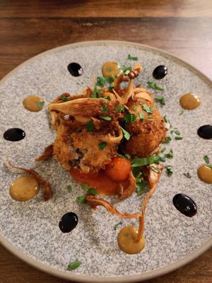 Mushroom arancini on a giant plate at L'Osteria Italiana in York