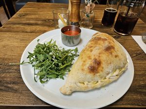 Vegan calzone (containing broccoli, green beans, tomatoes, and mushrooms)...but with dairy cheese! at L'Osteria Italiana in York