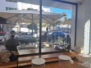 Outdoor seating at % Arabica in Casablanca