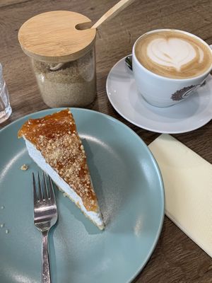 Sahnetorte mit Aprikosendecke; Cappuccino mit Haferdrink  at Cafe Spirit in Siofok