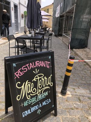View from end of alleyway. Signage  at Mãe Terra in Portimao