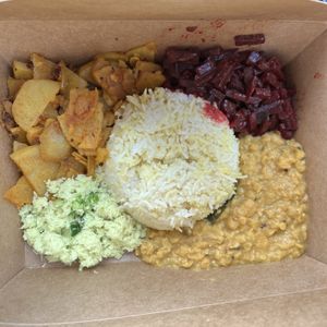 rice, coconut sambol, lentil curry  , deviled potatoes, beetroot curry  at Blue Lotus Temple in Woodstock