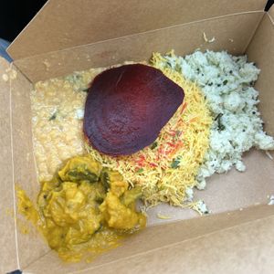 rice noodles, lentil curry, coconut sambol, pumpkin curry, beet   at Blue Lotus Temple in Woodstock