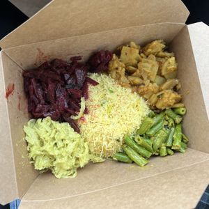 rice noodles, beet curry, deviled potatoes, green bean curry, curried cabbage  at Blue Lotus Temple in Woodstock