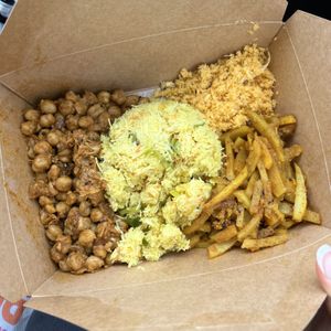 mixed rice noodles, deviled potatoes, chickpea curry, coconut sambol  at Blue Lotus Temple in Woodstock