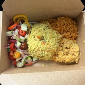vegetable salad, rice noodles, lentil dahl, coconut sambol  at Blue Lotus Temple in Woodstock