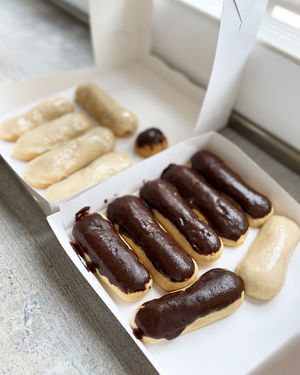 Vegan eclairs with chocolate and white glaze at 2022_bak in Yerevan