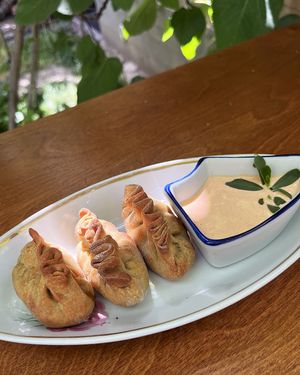 Vegan pirozhki with soy meat, herbs and kimchi ayoli sauce at 2022_bak in Yerevan
