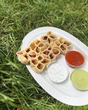 Vegan momo dumplings: 1) vegan meat & shpanka cherries; 2) Nepali masala & veggies. Three sauces: ginger red pachadi, tarragon aioli, coconut tan at 2022_bak in Yerevan
