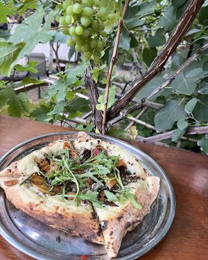 Peach Preach Pizza in collab w/Nagotove project: cashew sauce, grilled peaches, homemade fatty soy mince, Armenian capers, arugula at 2022_bak in Yerevan