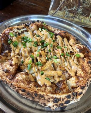 Tofu skin, pineapple & peanut butter vegan pizza at 2022_bak in Yerevan