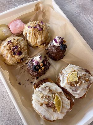 My selection of divine vegan sweets for a week: cinnamon cinnabons, "snickers" brownies, peanut butter caramel cinnabons, and mochi at 2022_bak in Yerevan