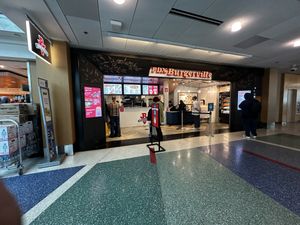 The pdx location by d7 gate   at PDX - Burgerville - Clocktower in Portland