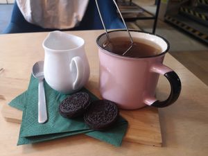 Tea with almond milk and vegan biscuits at Zakładka in Bydgoszcz