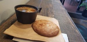 Long black & orange, almond cookie at Origin Coffee in North West London