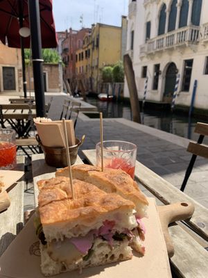 Sandwich with canal view seating  at La Bottiglia in Venice