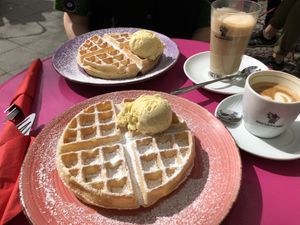 Vegan waffles with vanilla ice cream and powdered sugar, cappuccino and latte macchiato   at Wafele in Berlin