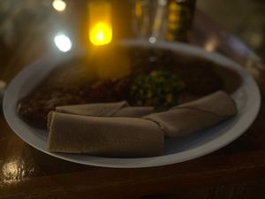 Feast platter with seven curries at Bunna Cafe in Brooklyn