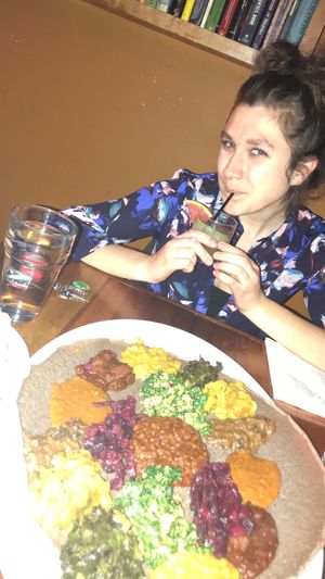 my friend and our awesome food at Bunna!  at Bunna Cafe in Brooklyn