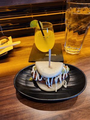 Vegan bao bun - impossible patty, cucumber, Guacamole, vegan mayo at JINYA Ramen Bar in Lehi