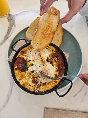 Kasundi baked eggs at Greens & Grains Cafe in Beaconsfield