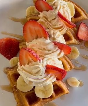 Vegan, gluten-free waffles with coconut whipped cream! Amazing!   at Organic Farmers Table in Sarasota