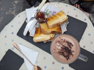Toast, jam and hot chocolate. at The Vegan Coffi House in Aberdare