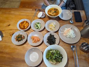 Sesame noodles and ramen with side dishes at Sulgodang in Busan