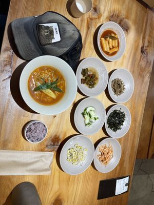 Vegan ramen ,black rice ,rice cake things ,jalapeño,pickled cucumbers, bean sprouts , kimchi,something else, and shredded nori  at Sulgodang in Busan