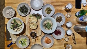 From the right: Sticky sweet potato and mushrooms noodles, tofu steaks, soy based noodles. All around free condiments. at Sulgodang in Busan